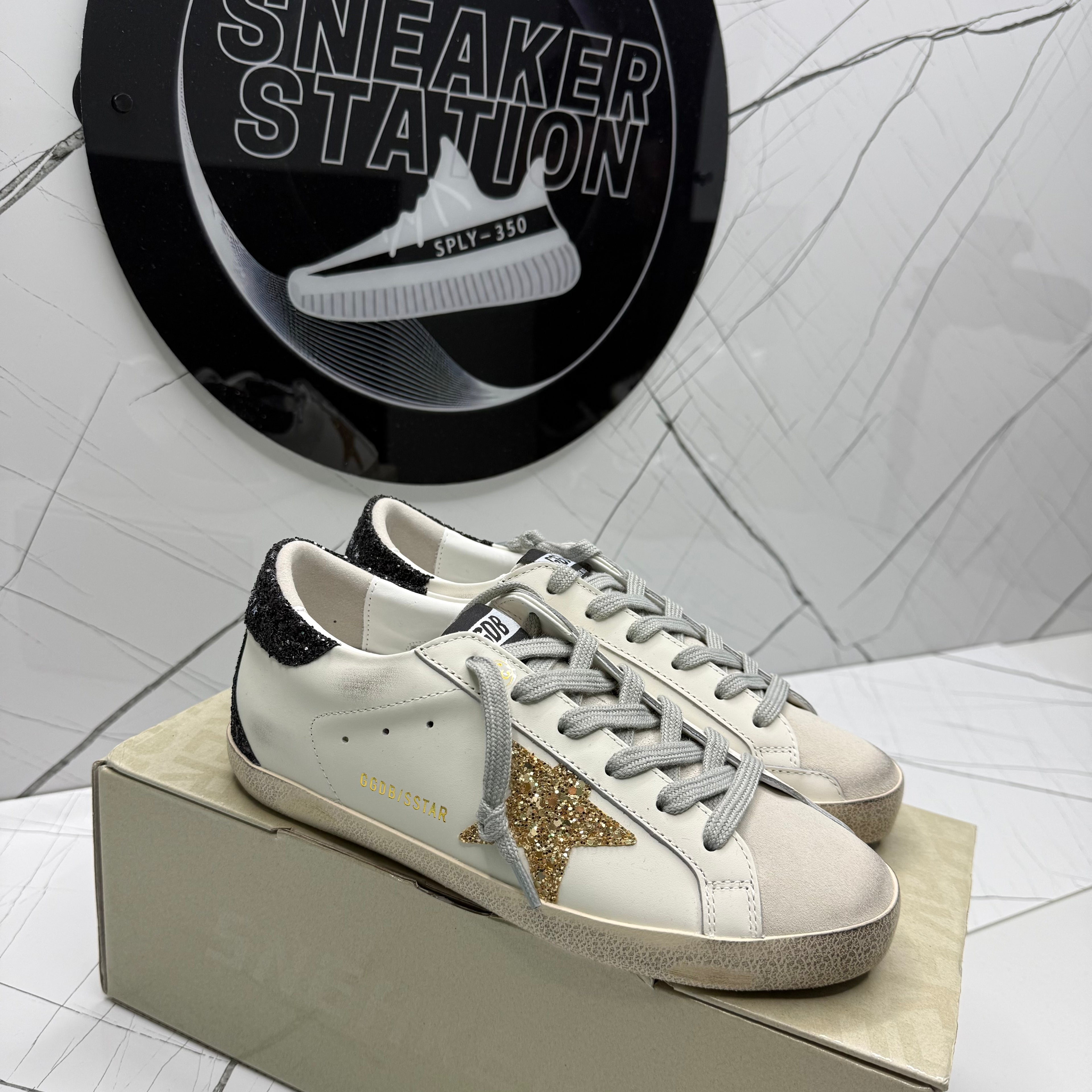 Golden Goose Super-Star In nappa Leather with Gold Glitter Star and Black Glitter heel tab
